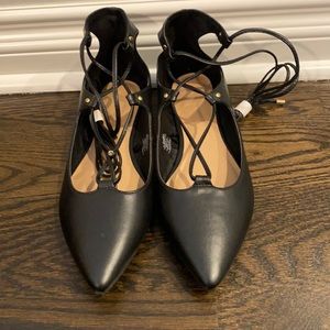 Never worn black tie up flats size 9